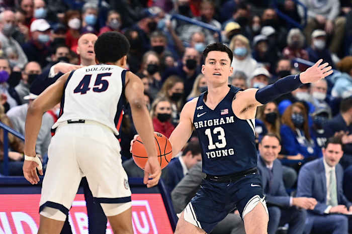 Brigham Young Cougars guard Alex Barcello (13) against Gonzaga Bulldogs guard Rasir Bolton (45) in the first half at McCarthey Athletic Center.